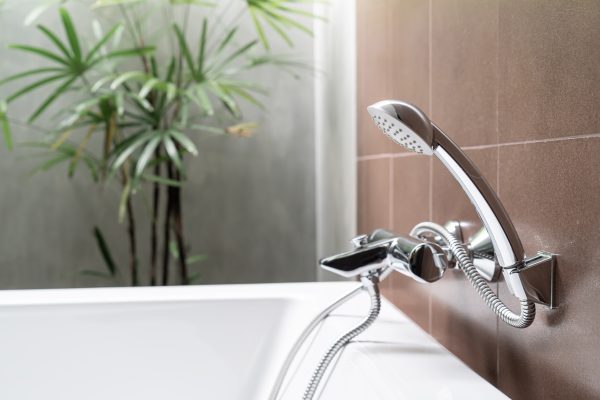 close-up shower head in bathroom